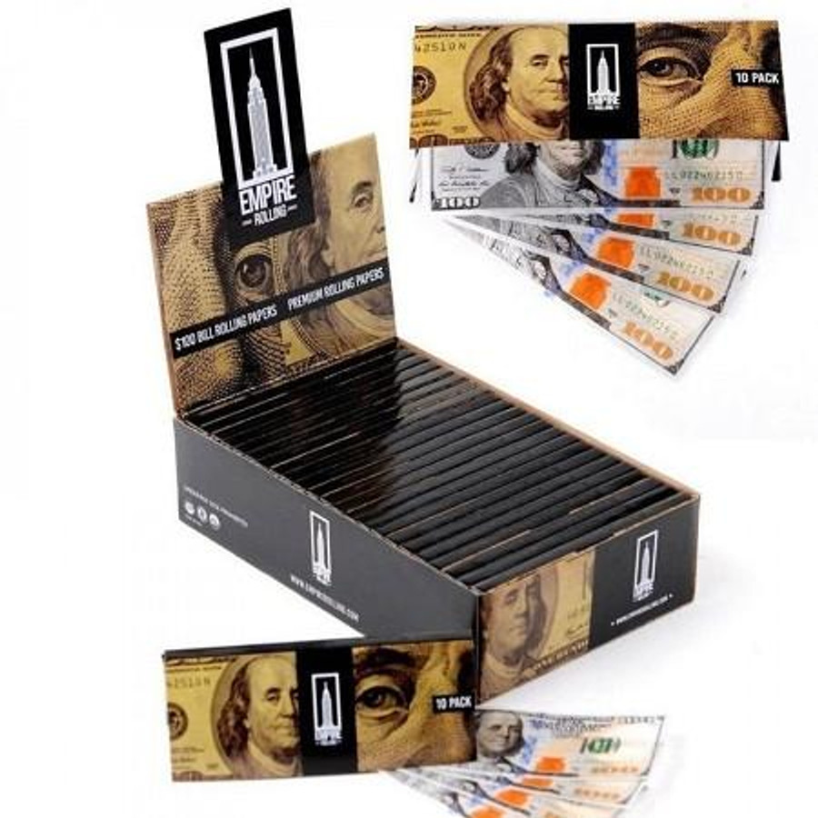 Empire Papers Empire Rolling Papers Full Box, black open box display with multiple rolling papers and fake hundred-dollar bills for display.