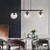 Volume Lighting V1593-5 - 3-Light Black Linear Island Pendant - Clear Glass Globes