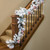 Vickerman A806313LED - 9 ft Flocked White on Green Pine Christmas Garland - Multi-colored LED