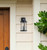 Westinghouse 6120600 - 1-Light Textured Black Outdoor Wall Lantern with Motion Sensor
