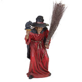Life-sized witch with broomstick
