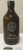 Bruine glazen fles van 1000 ml met zwarte dop en witte opdruk Bormo Shampoo