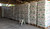 Pallets met Isocell cellulose‑isolatie in magazijn