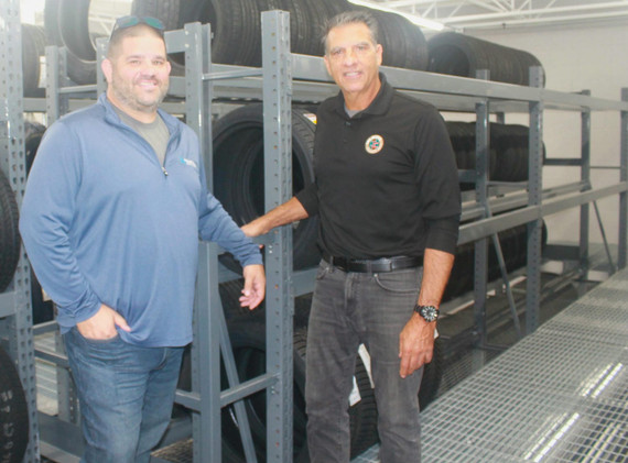 Auto Tire Repair Center: Creating a Cohesive Workspace with a Mezzanine, Tire Storage, and a Tire Conveyor