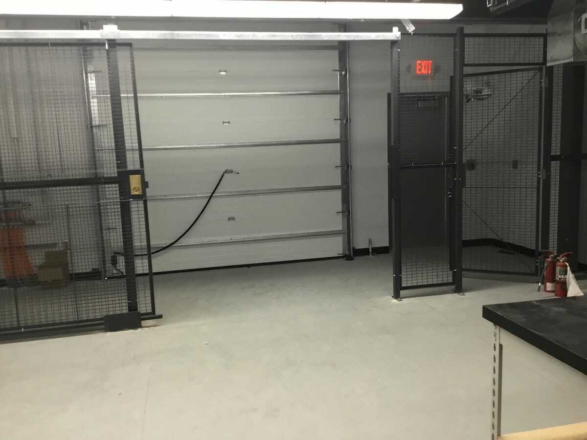 Honda dealership wire cage doors open