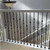 Staircase using the Hollow Single Basket Ribbon Twist Metal Baluster. 1/2" square x 44" length.