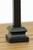 Flat Shoe for 1/2" sq. metal stair balusters (spindles). The base of this shoe is approximately 1-1/4" square. The shoe has a set screw in the side. All shoes are made from cast aluminum and powder coated to match the metal balusters unless otherwise noted.