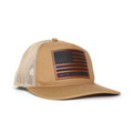 A tan trucker-style snapback hat featuring a structured canvas front and white mesh back. The front panel displays a rectangular faux leather patch engraved with the American flag and United Kennel Club logo. A tan trucker-style snapback hat featuring a structured canvas front and white mesh back. The front panel displays a rectangular faux leather patch engraved with the American flag and United Kennel Club logo.