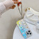 iPhone 16 Pro Electroplating Laser Flower Phone Case with Wrist Strap - Peach Blossom AH4