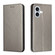 iPhone 16 Plus Carbon Fiber Texture Magnetic Flip Leather Phone Case - Grey