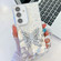 Samsung Galaxy A16 5G Plating Glitter Lens Film Texture Butterfly Holder Wristband Phone Case - White Feathers