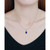 Simulated Blue Sapphire and Cubic Zirconia Halo Pendant
