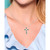 Sterling Silver Simple 1 1/4 (ct. t. w.) Created Green Emerald and Created White Sapphire Marquise Bezel Set Cross Pendant Necklace