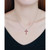 Created Ruby and Cubic Zirconia Cross Pendant