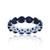 Created Blue Spinel Eternity Band in Rhodium Plated Sterling Silver