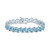 Swiss Blue Topaz (20 ct. t.w.) & White Topaz (5-1/3 ct. t.w.) Cluster Bracelet in Sterling Silver