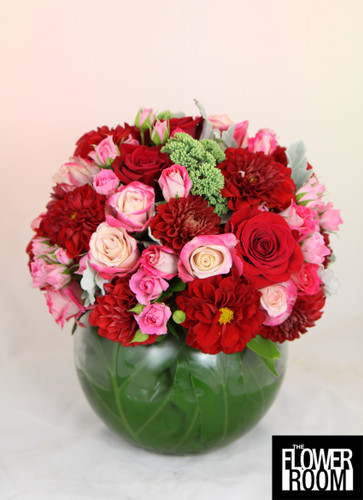 large floral fishbowl arrangement