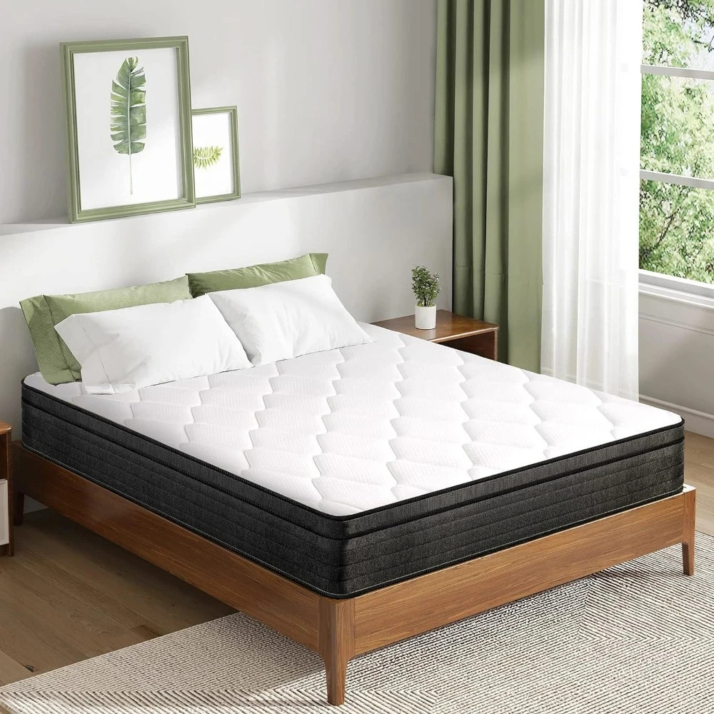 Mattress on wooden bed with green pillows