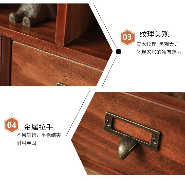 Close-up of a metal handle on a wooden drawer