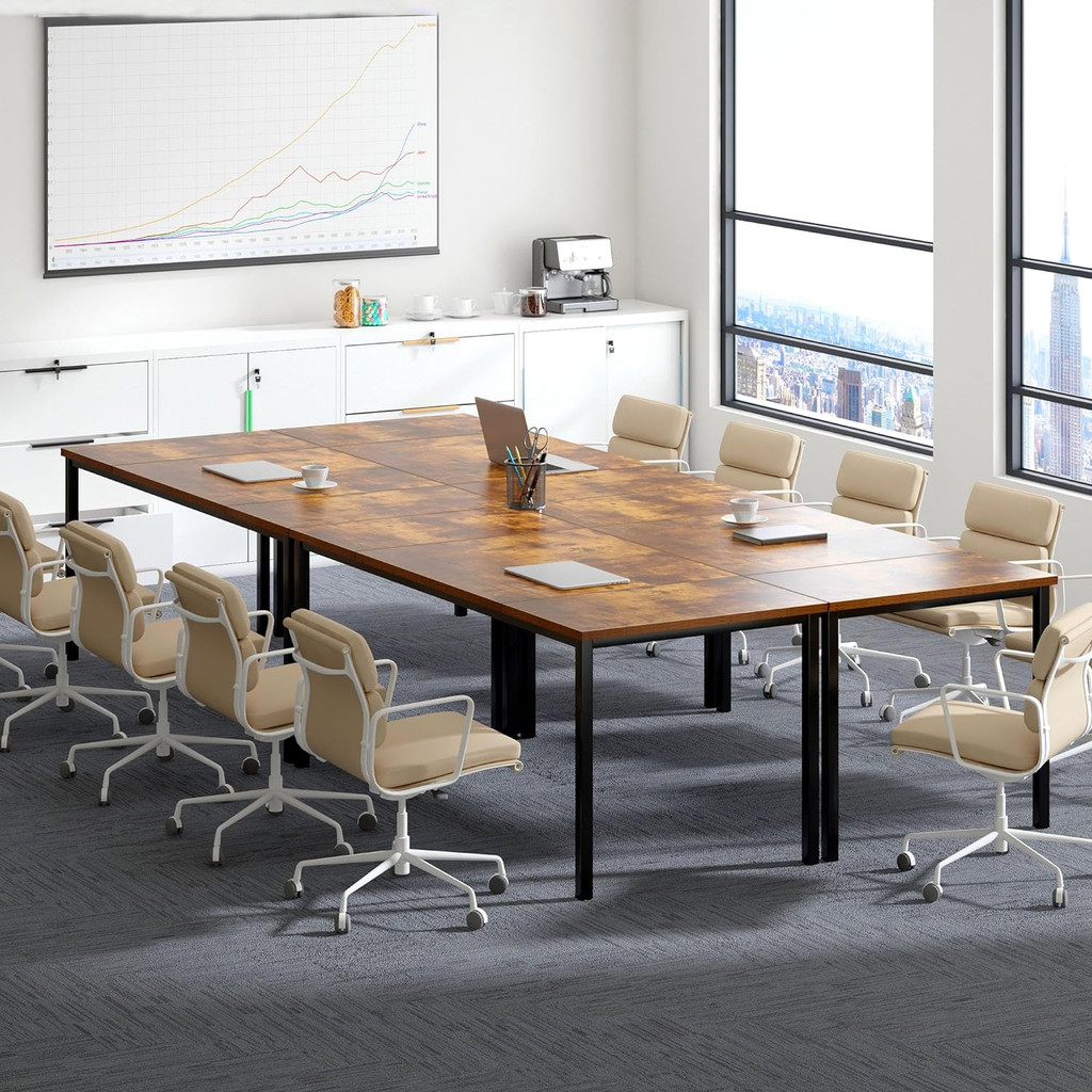 Large conference table with multiple chairs in office
