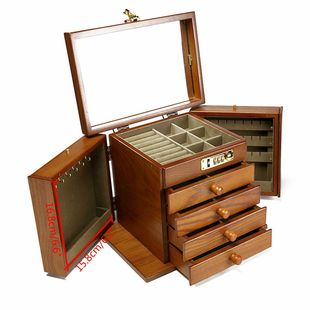 Wooden jewelry box with lid open showing interior compartments