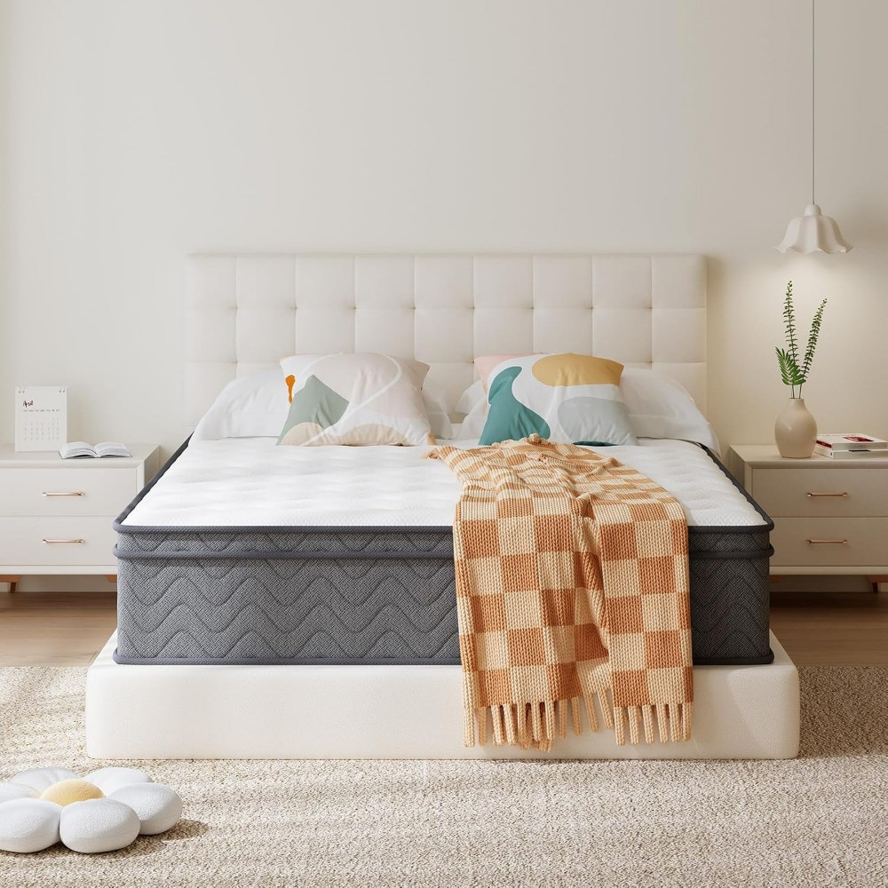King mattress in gray base with wave-pattern sides and quilted white top