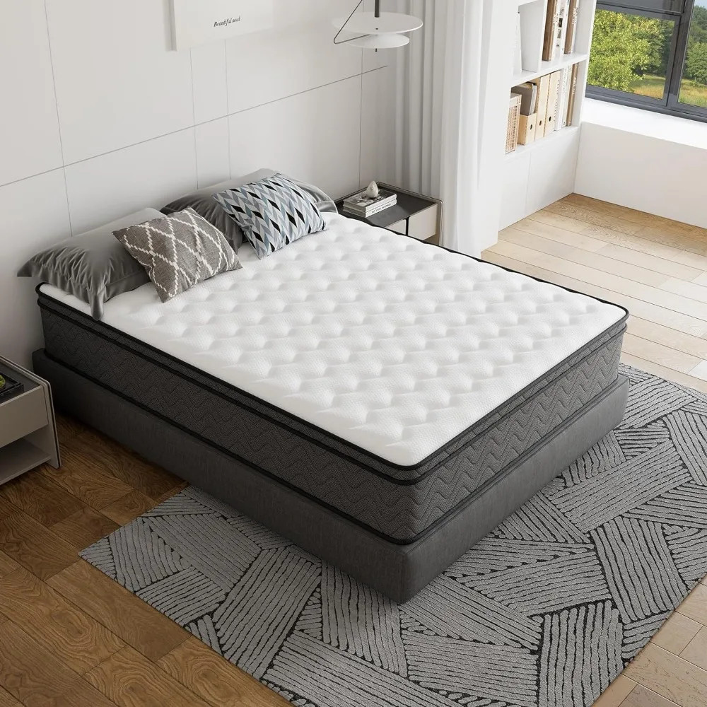 Queen hybrid innerspring mattress shown at an angle with quilted white top