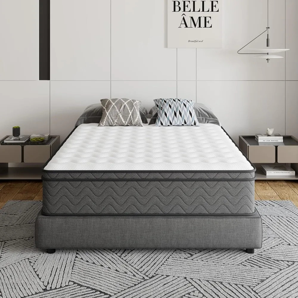 Queen mattress with white quilted top and dark gray wave-pattern sides