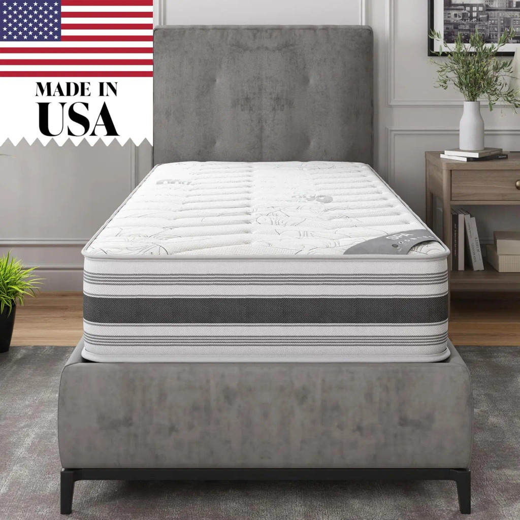 9-inch twin mattress on a gray upholstered bed frame with Made in USA label