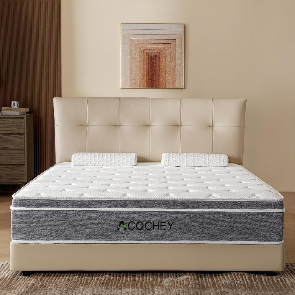 Wide view of bed with tufted headboard and mattress in a bedroom