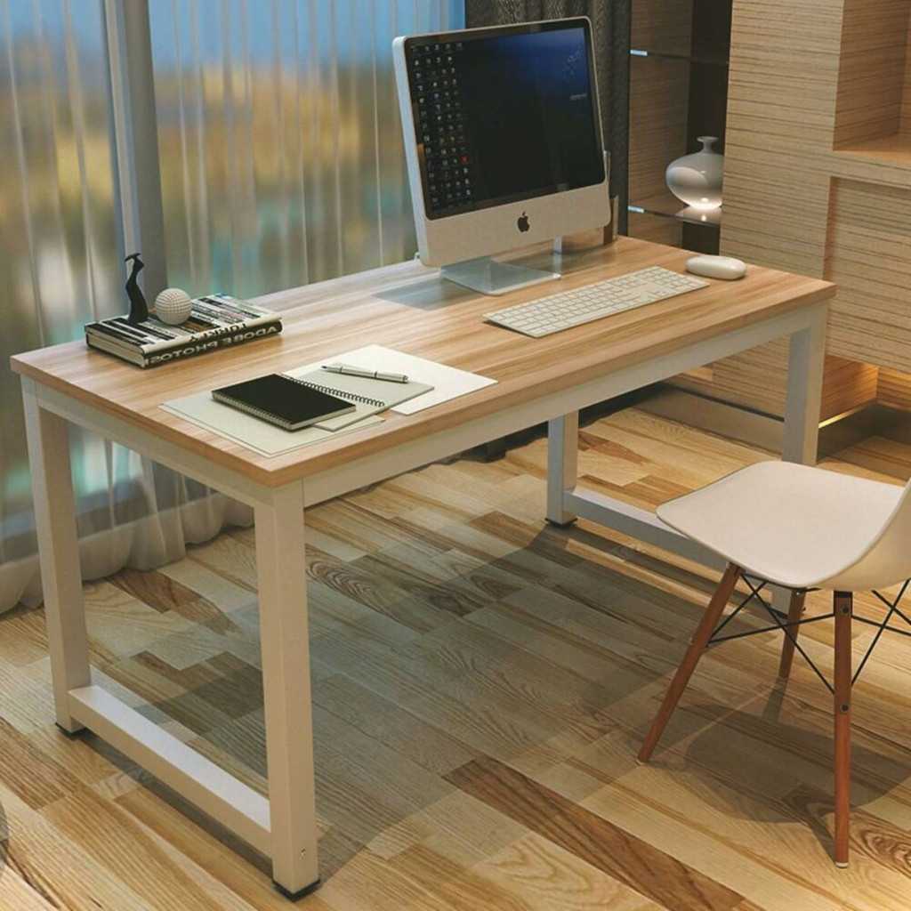 Desk with computer on wooden top