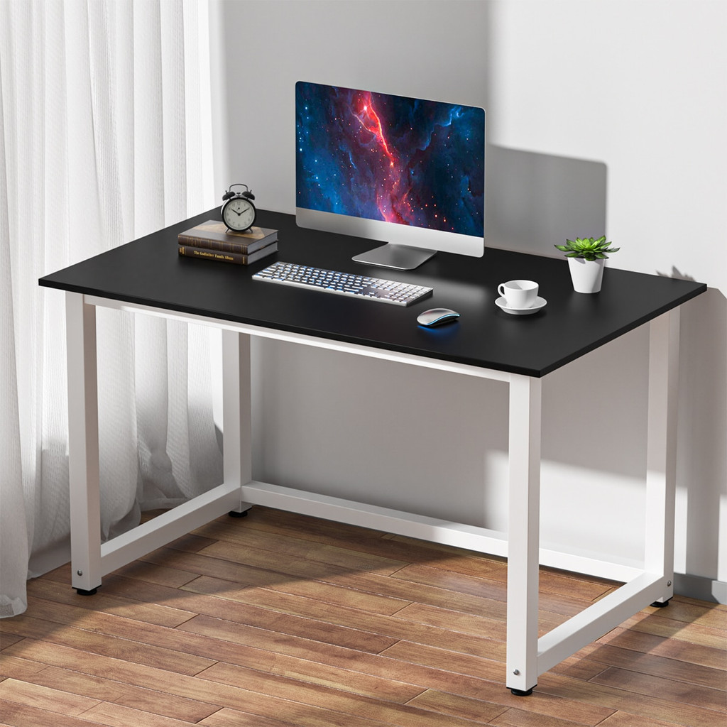 Desk with black tabletop and white frame