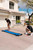 Backyard Putting Green Pong Style Golf Mat with 2 Putters, 2 Balls & Hole Covers - 9 ft