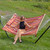 Sunnydaze Rope Hammock with Stand for Outside- 275-Pound Capacity - Includes 12-Foot Hammock Stand, Spreader Bar, Pad, and Pillow - Tropical Orange
