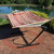 Sunnydaze Rope Hammock with Stand for Outside- 275-Pound Capacity - Includes 12-Foot Hammock Stand, Spreader Bar, Pad, and Pillow - Tropical Orange