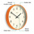JONES CLOCKS® Studio wall Clock | Modern Round Style | 12 inch | Orange | Easy to Read Numbers | Versatile Design for Kitchen
