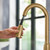 Moen Orivesi Bronzed Gold One-Handle High Arc Pulldown Kitchen Faucet with Power Boost, 87891BZG