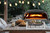 NutriChef Portable Outdoor Gas Pizza Oven - Includes Foldable Feet, Adjustable Heat Control Dial, Burner, Stone & Regulator Hose - Cooks 12" Pizza in 60 Seconds - 25.24'' x 16.14'' x 12.40'' IN