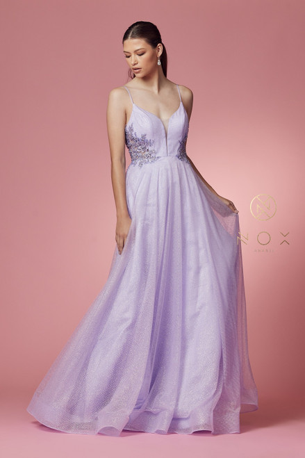 Beautiful lilac color A-line silhouette long formal dress that boasts a delicate embroidered design on the bodice in style NX T1033. With flowing skirt, V neckline and zip up back for closure - shop prom avenue 

Available in Lilac