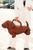 Size : 18" X 12" X 9" Top Handle Size : 5.5" L Strap Size : 52" L / Detachable, Adjustable One Inside Zipper Pocket Zipper Closure Eye-catching dachshund shaped statement handbag designed to turn heads and spark conversation. Spacious interior with secure closure and top handles for easy carry. Perfect for fashion-forward boutiques, themed collections, and customers seeking a playful, standout accessory. Faux Leather Dachshund Dog Crossbody Handbag