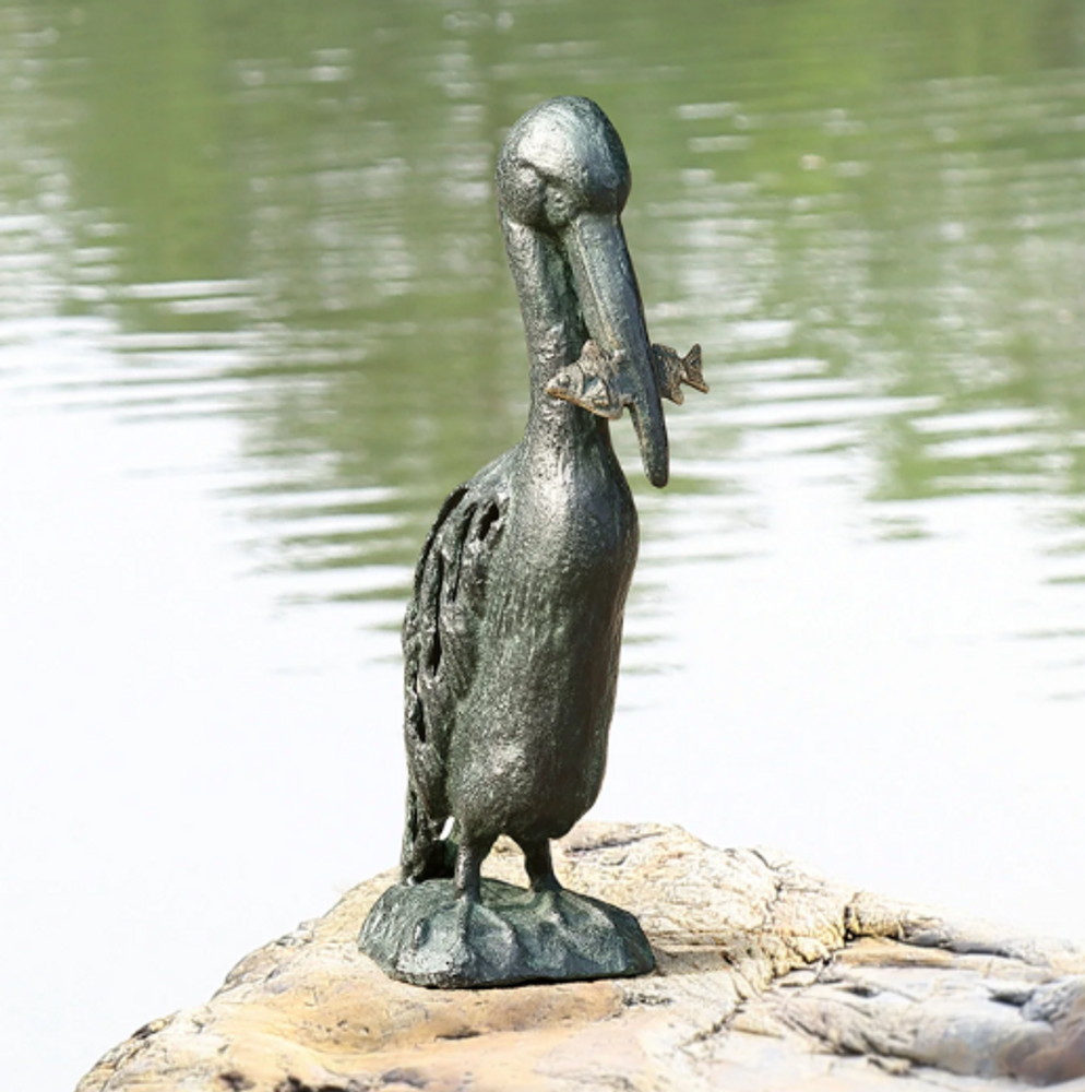 Snacking Pelican Garden Sculpture