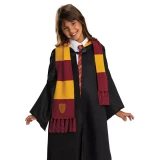 Disguise Harry Potter Gryffindor House Crest Scarf Costume Accessory, red and gold striped scarf with Gryffindor crest, worn by a young girl in a Harry Potter costume.