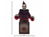 Morris Skeleton Clown Mechanical Jack-in-the-Box 5 Ft. Halloween Decoration, a spooky skeleton clown with white face paint, red eye shadows, black nose, wearing a purple hat and costume, emerging from a vintage circus-themed box.