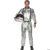 Underwraps Astronaut Silver Space Suit Costume - Adult, male model wearing a shiny silver astronaut suit with patches, holding a black and white astronaut helmet. Suitable for cosplay or themed events.