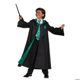 Disguise Harry Potter Slytherin Robe Deluxe - Child, a young boy wearing a black robe with green lining and Slytherin crest, holding a wand and smiling.