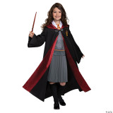 Disguise Hermione Granger Deluxe Child Costume, a young girl wearing a detailed Harry Potter-themed costume with a black cloak, red lining, Gryffindor crest, gray sweater, pleated skirt, wizard hat, and wand, suitable for cosplay or themed parties.