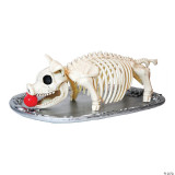 Seasons USA Roasted Pig Platter, decorative skeleton pig platter with a skull, rib cage, legs, tail, and a red cherry nose, displayed on a silver tray, for Halloween or themed parties.