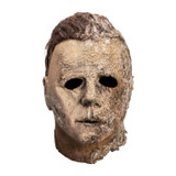 Trick or Treat Studios Halloween Ends Michael Myers Mask, realistic latex mask resembling Michael Myers' face from the horror film with weathered skin and dark eye holes.