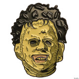Trick or Treat Studios Leatherface Enamel Pin - The Texas Chainsaw Massacre, featuring a detailed illustration of Leatherface's menacing face with stitched skin, dark hair, and a chainsaw blades incorporated into the design.