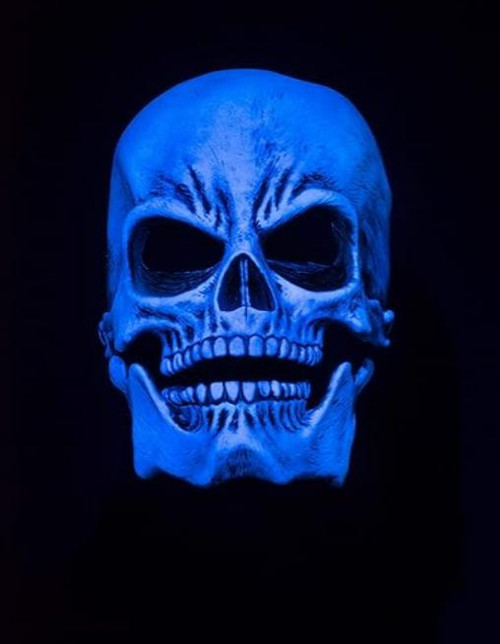 Zagone UV White Glow Sock Skull, a glowing skull mask under UV light with detailed bone structure and dark eye sockets.